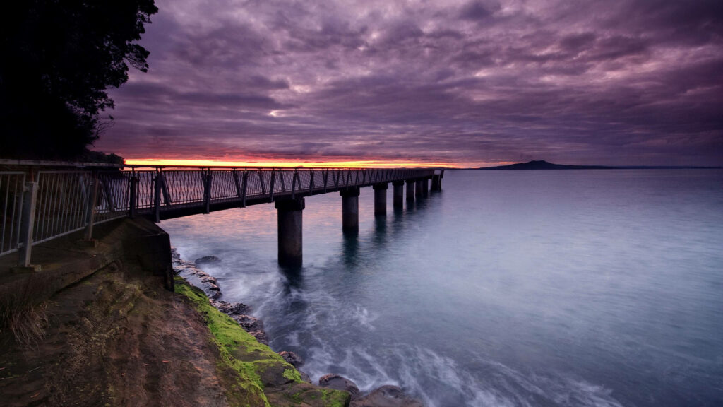 Coastal Meditations: Sunset Serenity at Oceanic Dock Wallpaper