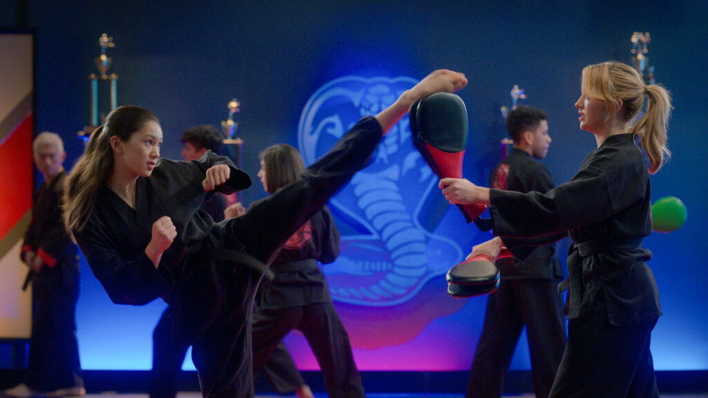 Dynamic Cobra Kai Wallpaper: Intense Martial Arts Training Background
