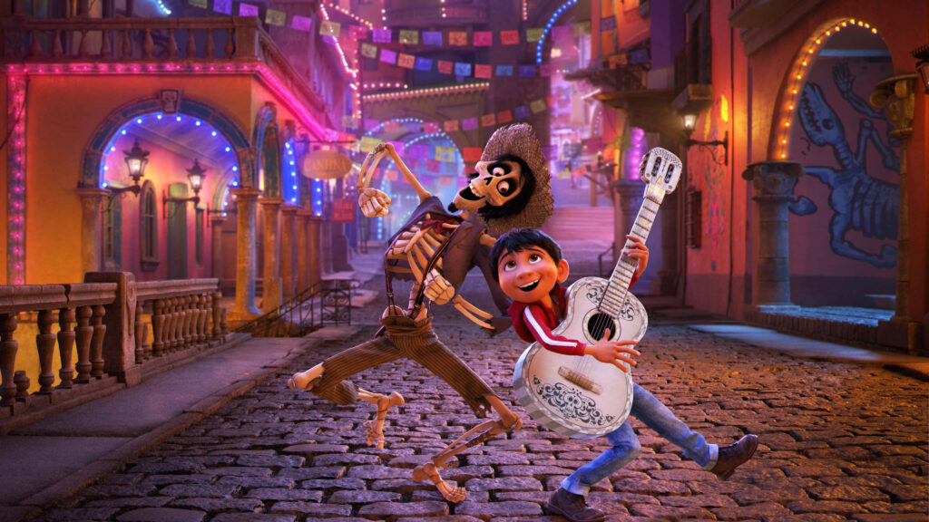 “Vibrant *Coco* Wallpaper: Miguel & Hector Celebrate Día de los Muertos”