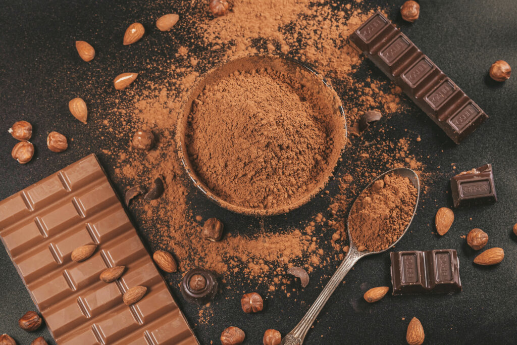 Delicious Cocoa & Chocolate Wallpaper: Nuts, Bars, and Spoon Design