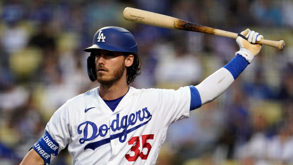 Cody Bellinger in Dodgers uniform batting during vibrant baseball stadium action wallpaper background