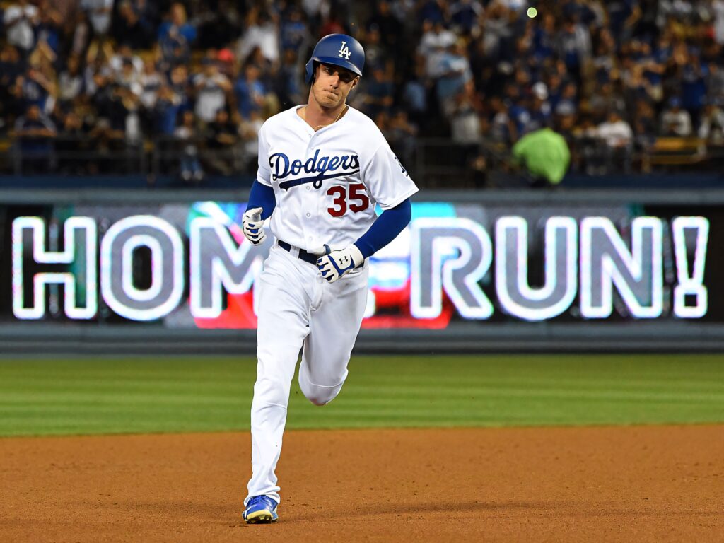 Cody Bellinger Dodgers home run wallpaper vibrant baseball stadium dynamic energy background