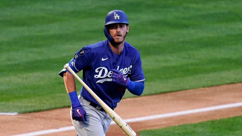 Cody Bellinger running on baseball field in Los Angeles Dodgers blue and white uniform wallpaper