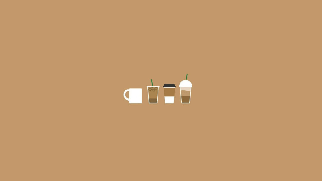 Coffee for the Aesthetic Soul: A Splendid Miniature Delight Against a Mesmerizing Laptop Background Wallpaper