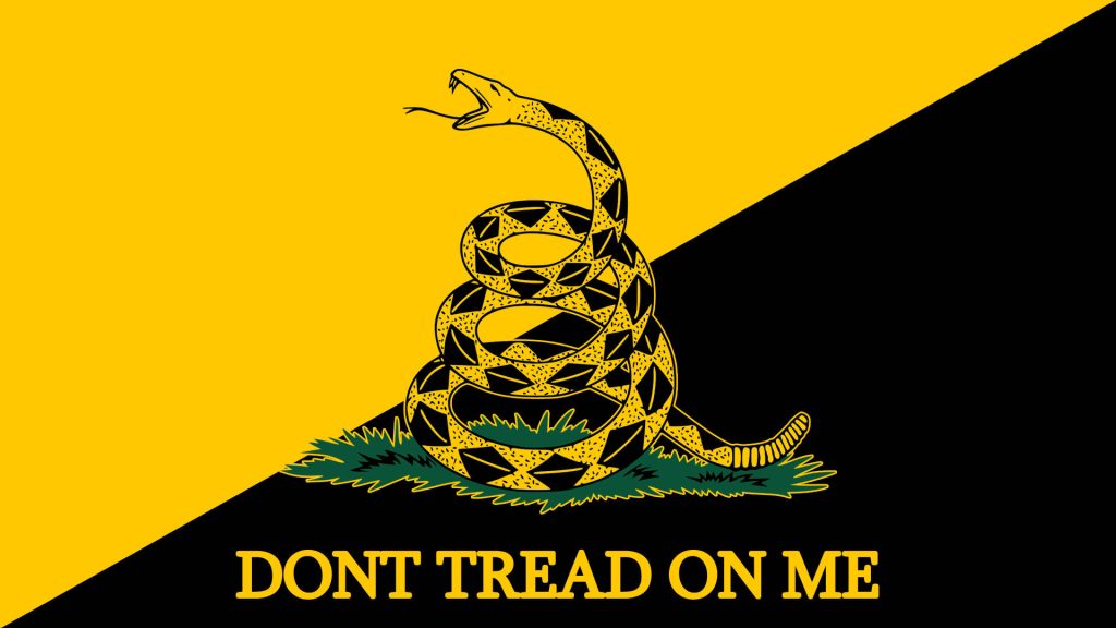 Coiled rattlesnake on yellow black background with Dont Tread On Me text Anarcho-Capitalist wallpaper