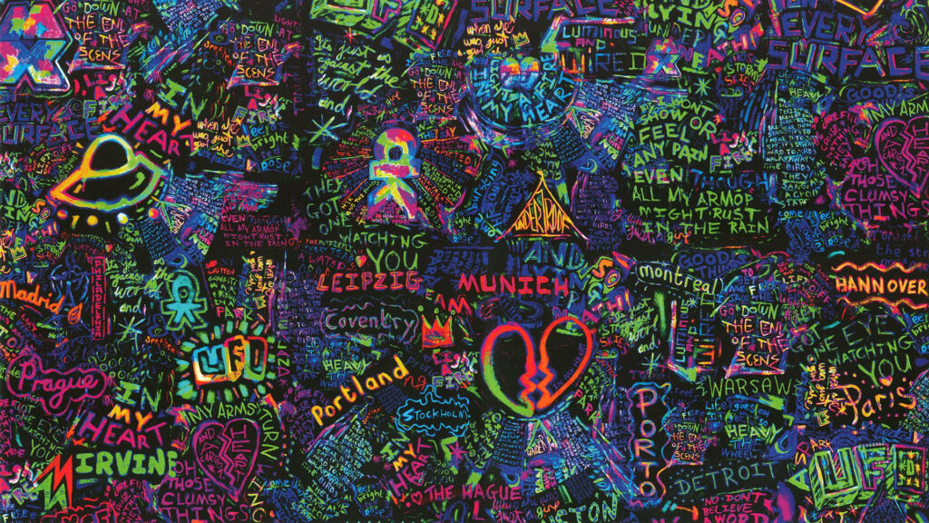 Colorful Coldplay Mylo Xyloto graffiti wallpaper with neon text abstract symbols and patterns