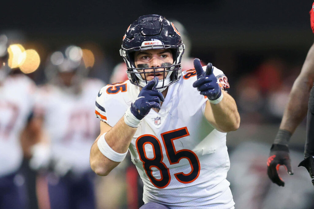 Cole Kmet Chicago Bears action shot navy blue orange white uniform football intensity wallpaper