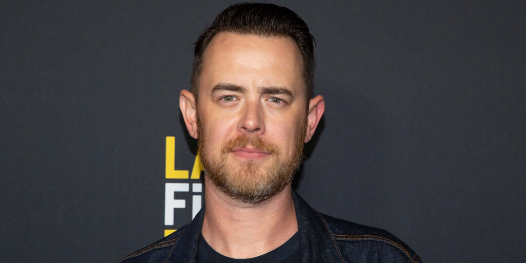Colin Hanks portrait with bold yellow white festival text on dark background natural lighting wallpaper