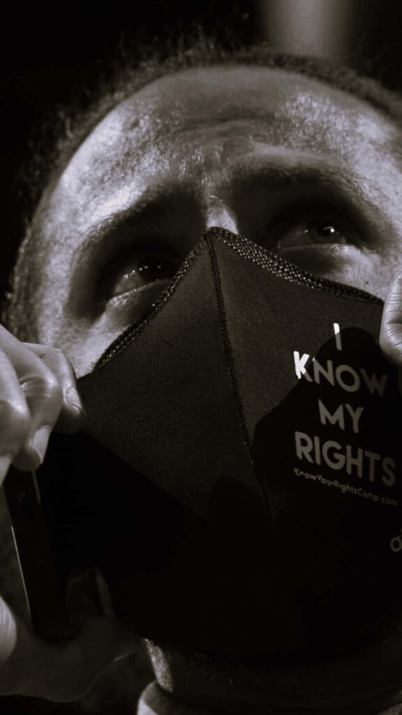 Colin Kaepernick close-up with I Know My Rights mask inspiring activism resilience social justice Wallpaper