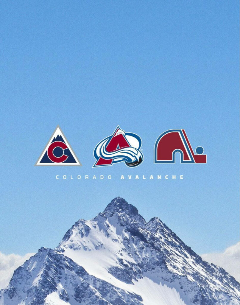 Colorado Avalanche logo evolution wallpaper with snowy mountain peak and clear blue sky background