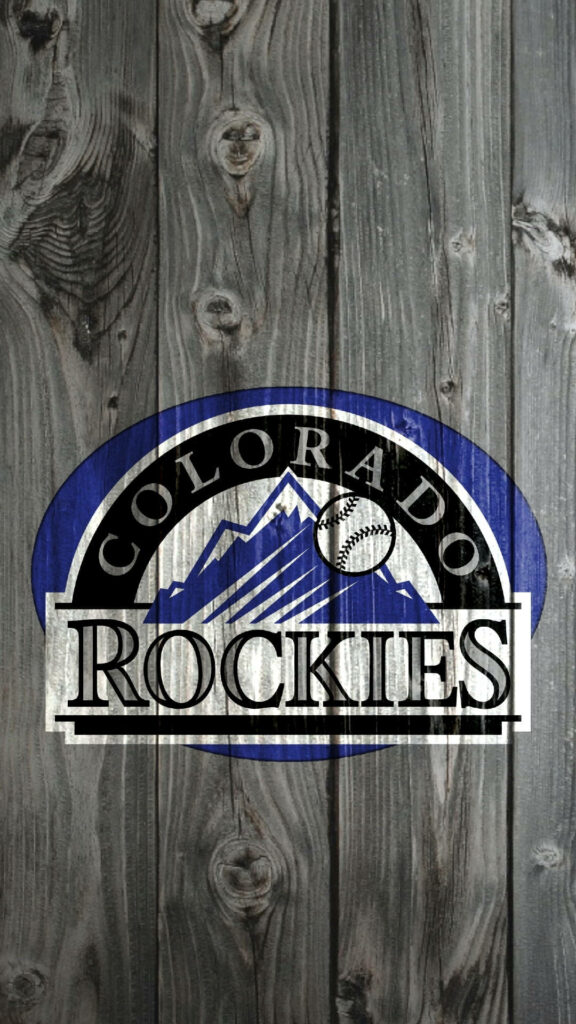 Colorado Rockies logo on rustic grey wood with blue white mountain silhouettes wallpaper