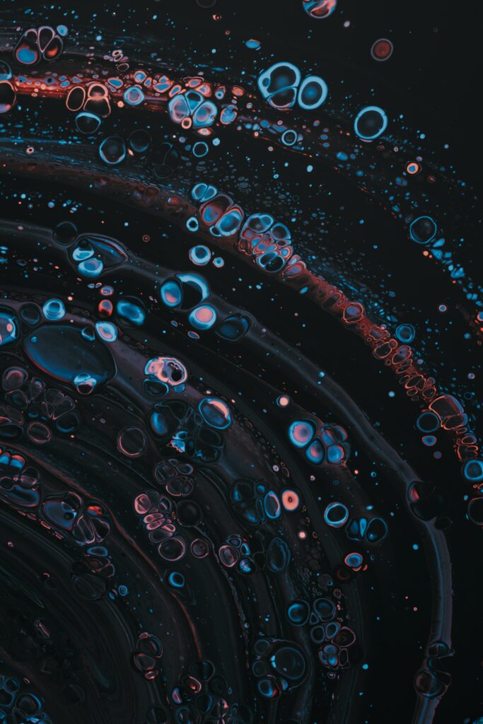 Mesmerizing Abstract Wallpaper: Colorful Paint Bubbles on Dark Background