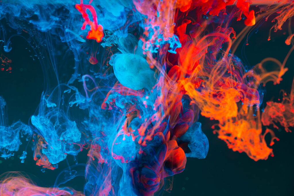 Abstract vibrant blue and orange smoke swirl on dark background colorful fluid motion wallpaper