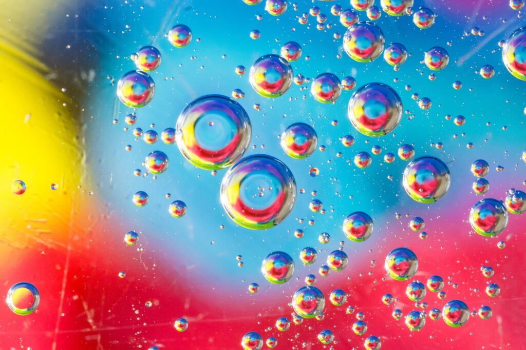 Vibrant Liquid Bubbles on Colorful Abstract Background Wallpaper