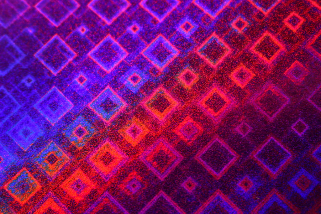 Vibrant Symphony: Abstract Composition of Blue and Red Shapes Wallpaper