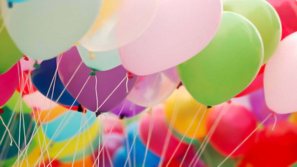 Colorful Balloons Float in the Sky: Festive Celebration Background Wallpaper