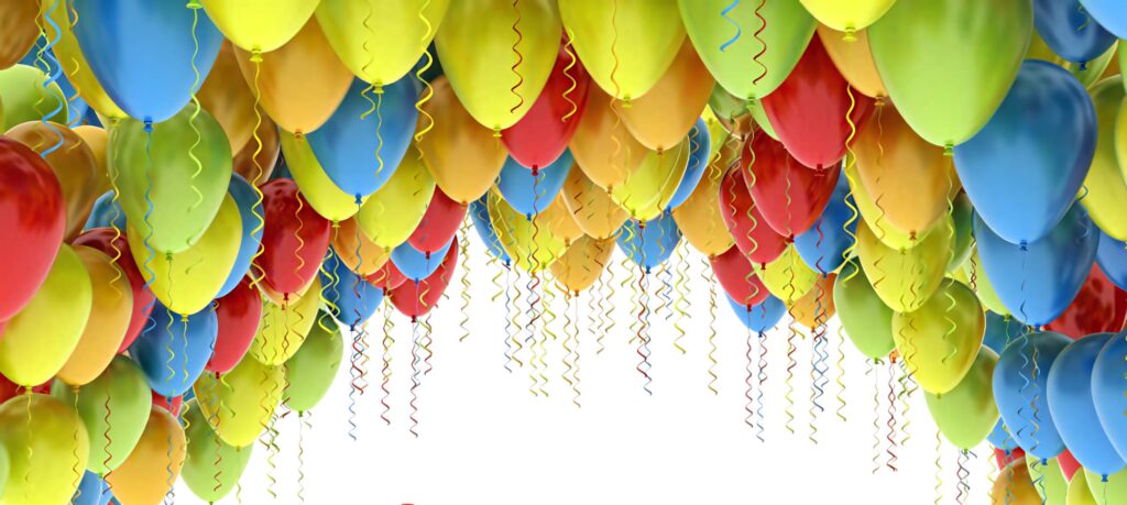 Colorful balloons floating against bright blue sky festive uplifting wallpaper background