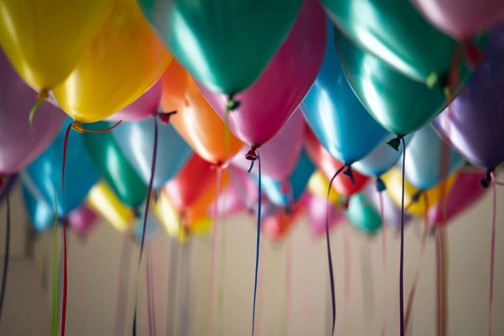 Colorful Balloons Against Soft Background for Festive Celebrations Wallpaper