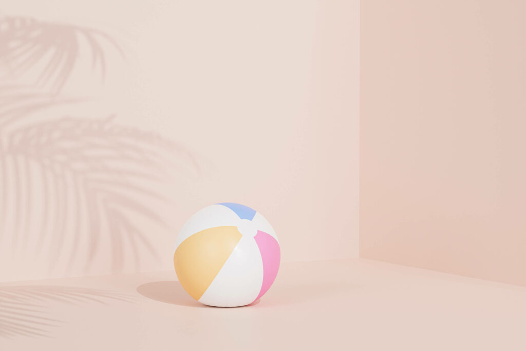 Serene Beach Ball Wallpaper: Modern Pastel Aesthetic Background