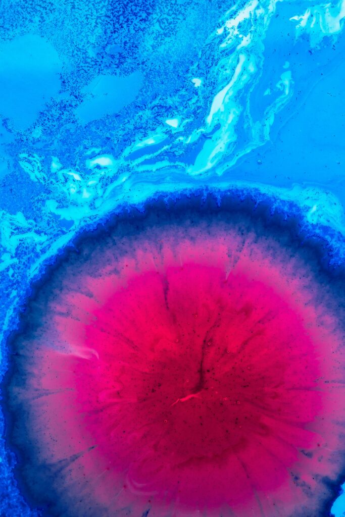 Vibrant Blue and Pink Liquid Wallpaper: Abstract Flowing Art Background