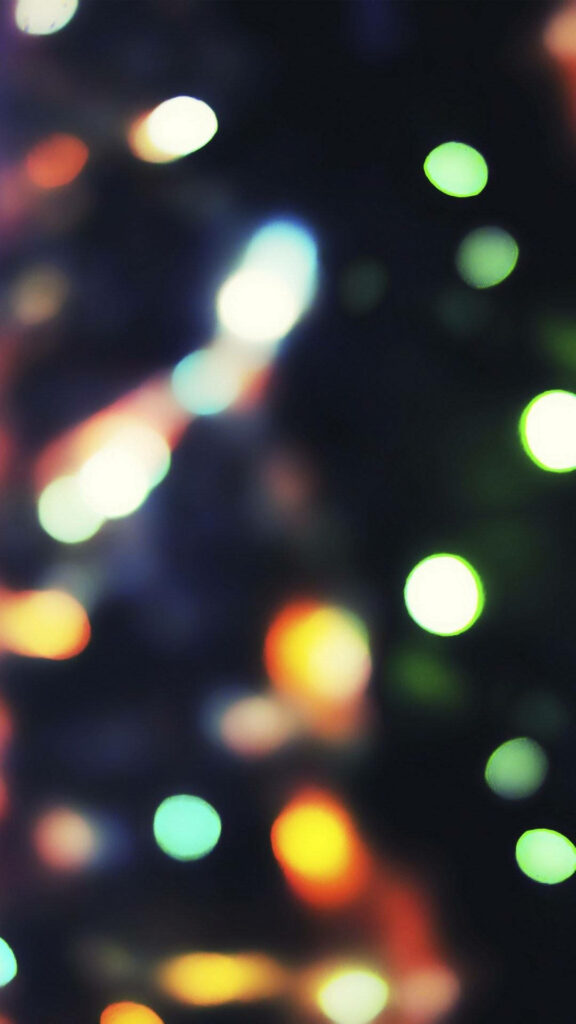 Colorful Blurred Christmas Lights iPhone Wallpaper for Festive Vibes
