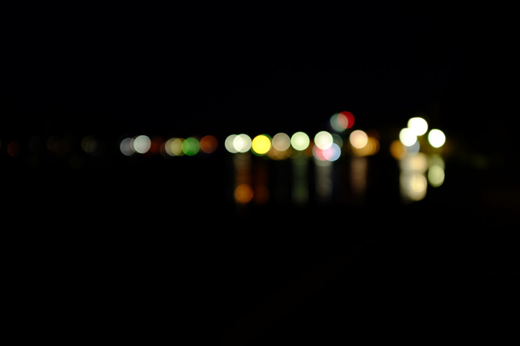 Elegant Dark Bokeh Lights Wallpaper - Captivating Abstract Background