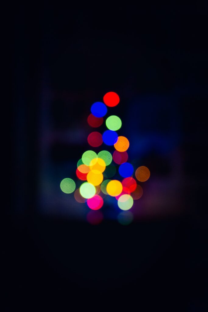 Colorful Circular Bokeh Lights on Dark Background - Abstract Wallpaper