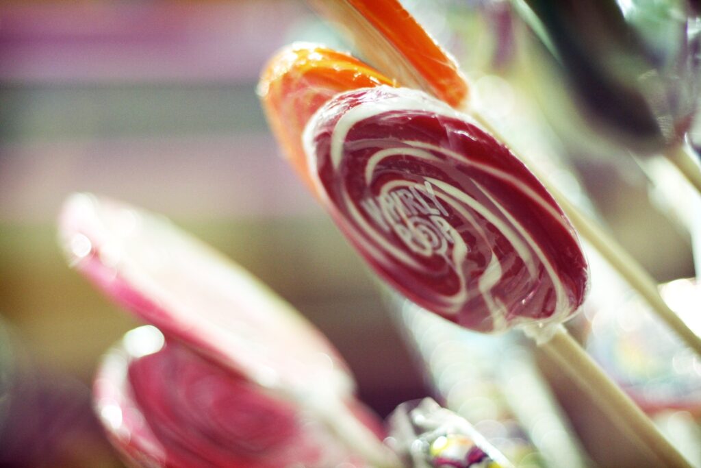 Colorful Candy Wallpaper: Close-Up of Glossy Caramel & Sugar Treats