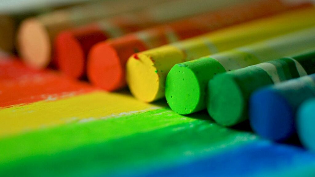 Vibrant Wallpaper: Colorful Chalk Crayons on Multicolored Lines