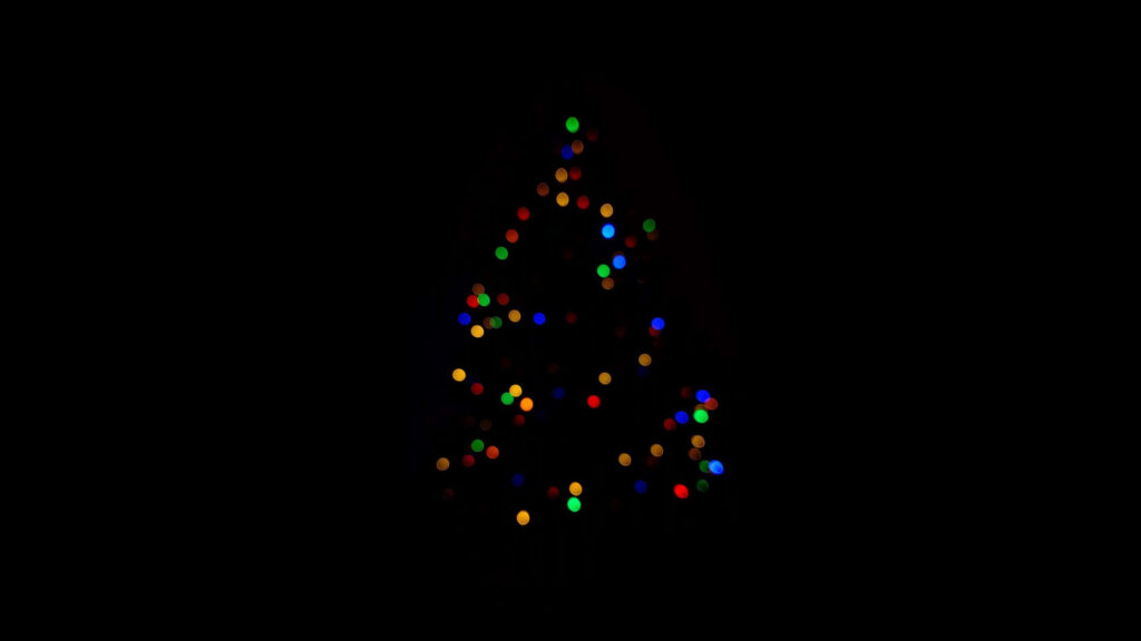 Festive Colorful Christmas Tree Lights - Cozy Holiday Background Wallpaper