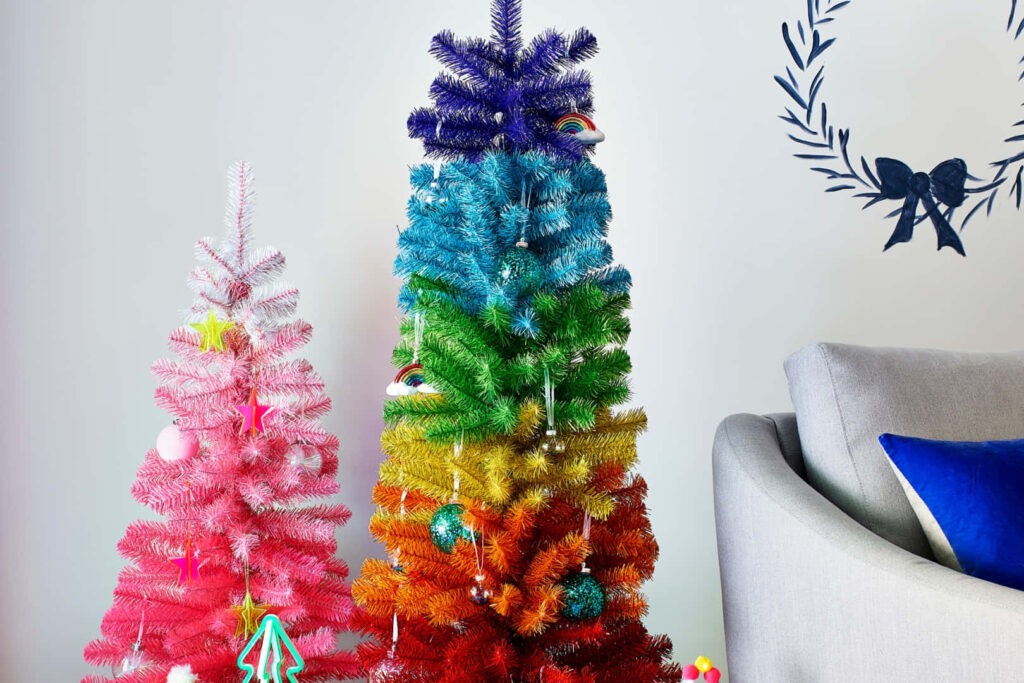 Festive Rainbow Christmas Tree Wallpaper for a Cheerful Holiday Background