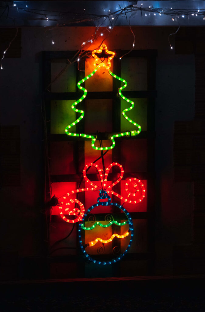 Colorful Christmas Lights Wallpaper: Festive Tree & Ornament Design