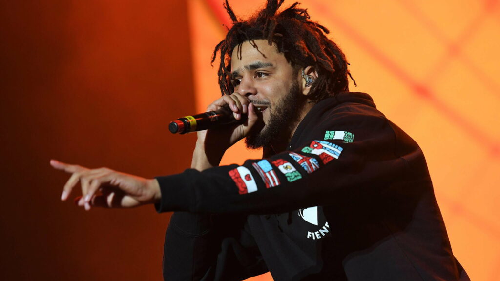 Vibrant Collaboration: J Cole and Mike Unite in a Colorful Serenade Wallpaper