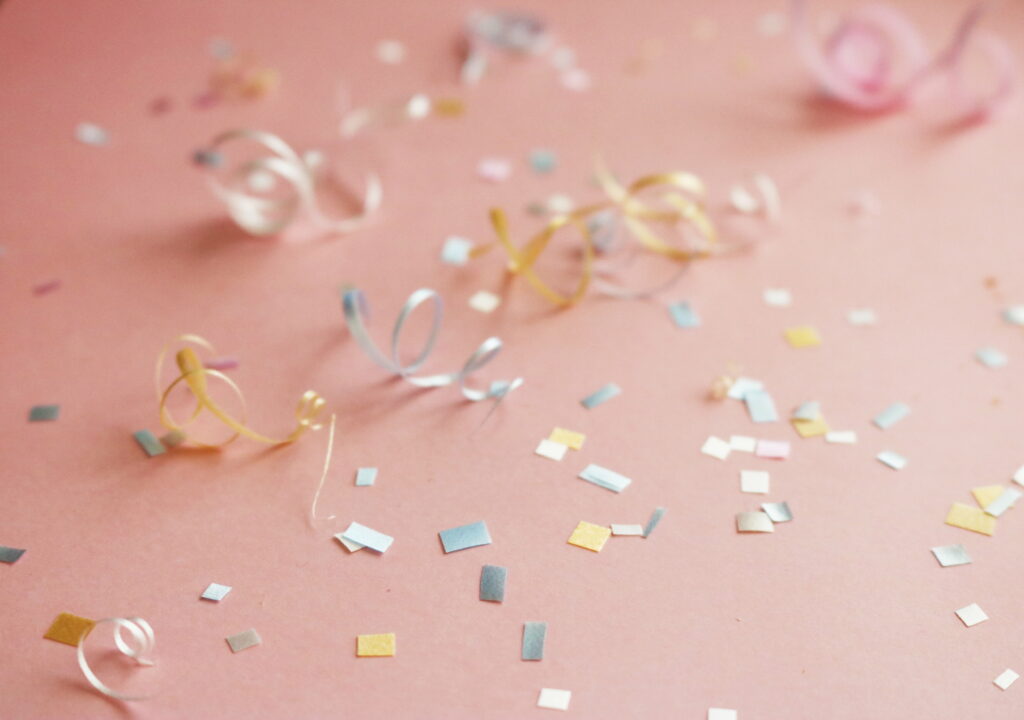 Vibrant Fiesta Scatter: High-Definition Wallpaper Snapshot of Colorful Confetti Carpet