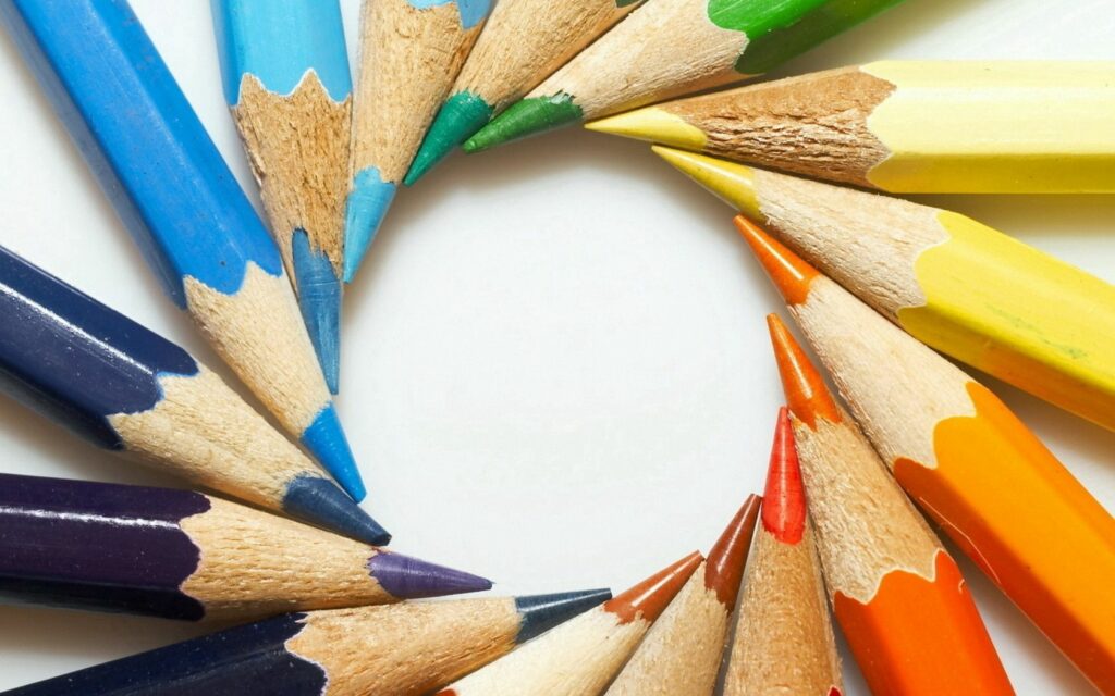 Vibrant Crayon Circular Wallpaper Background - Colorful Design