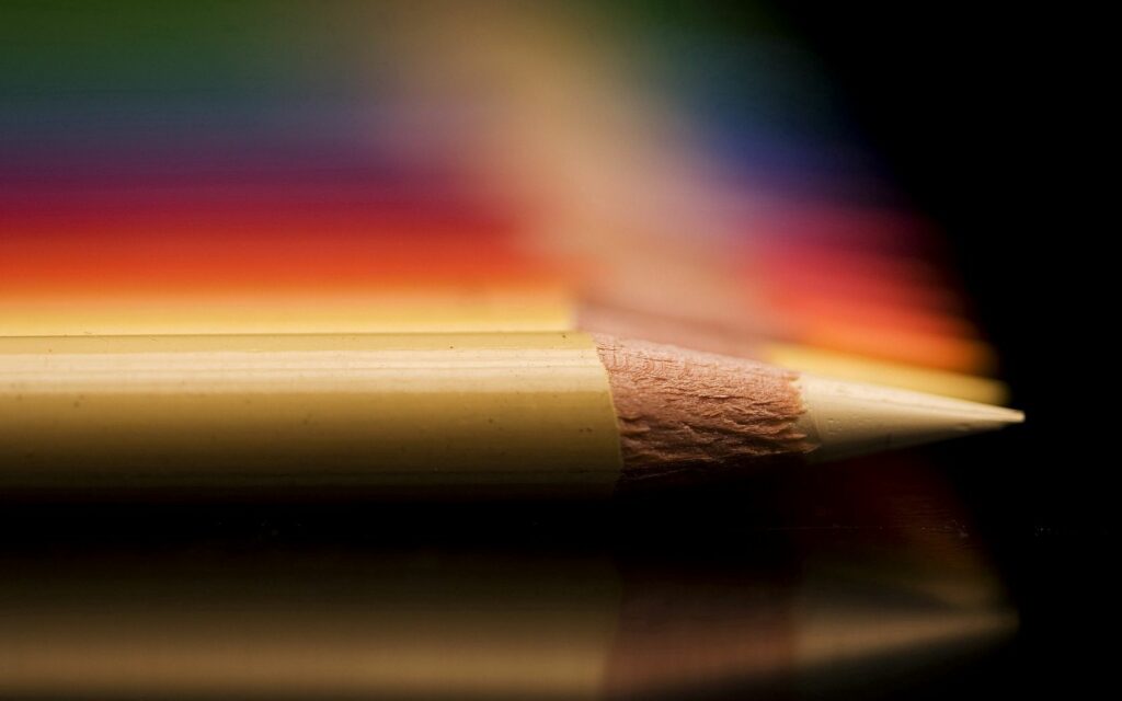 Vibrant Crayons Close-Up: Detailed Texture & Colorful Wallpaper Background