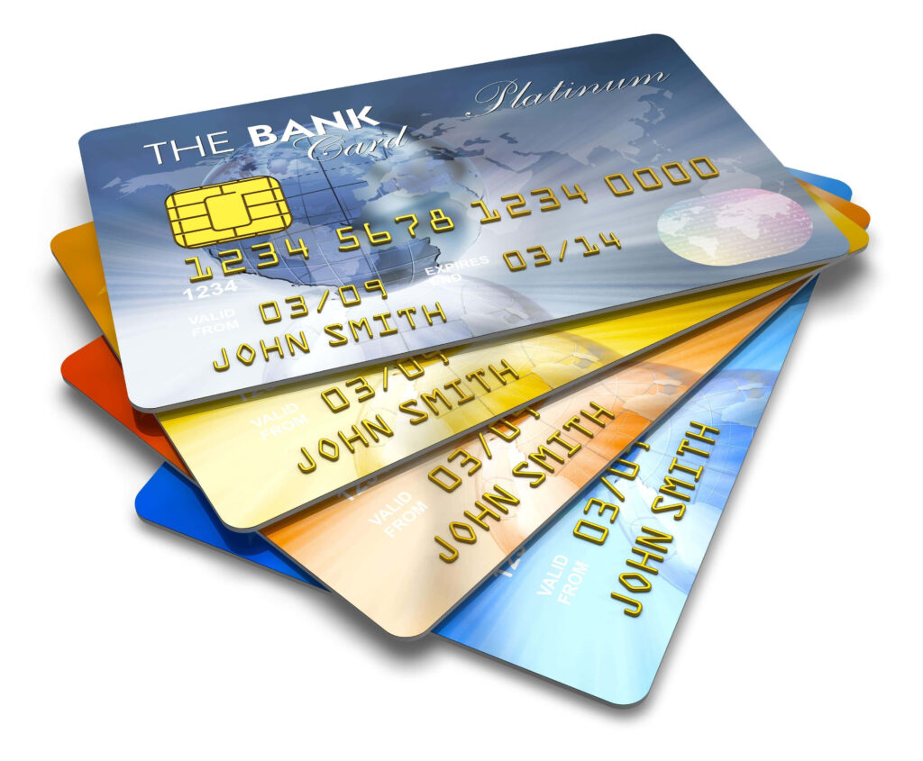 Stack of colorful credit cards with chip and world map on white background modern banking finance Wallpaper