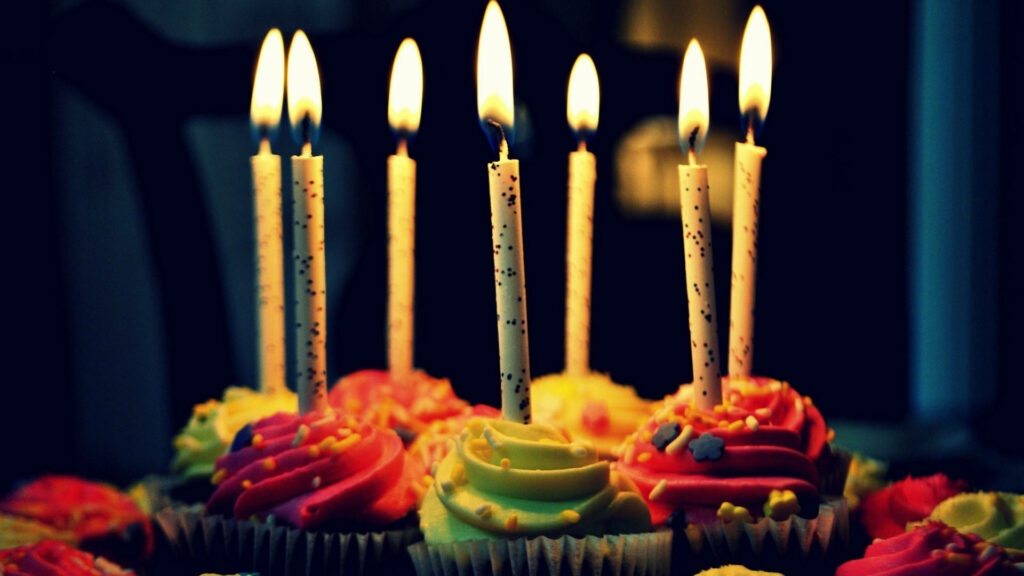 Colorful Cupcake Wallpaper: Festive Birthday Celebration Background