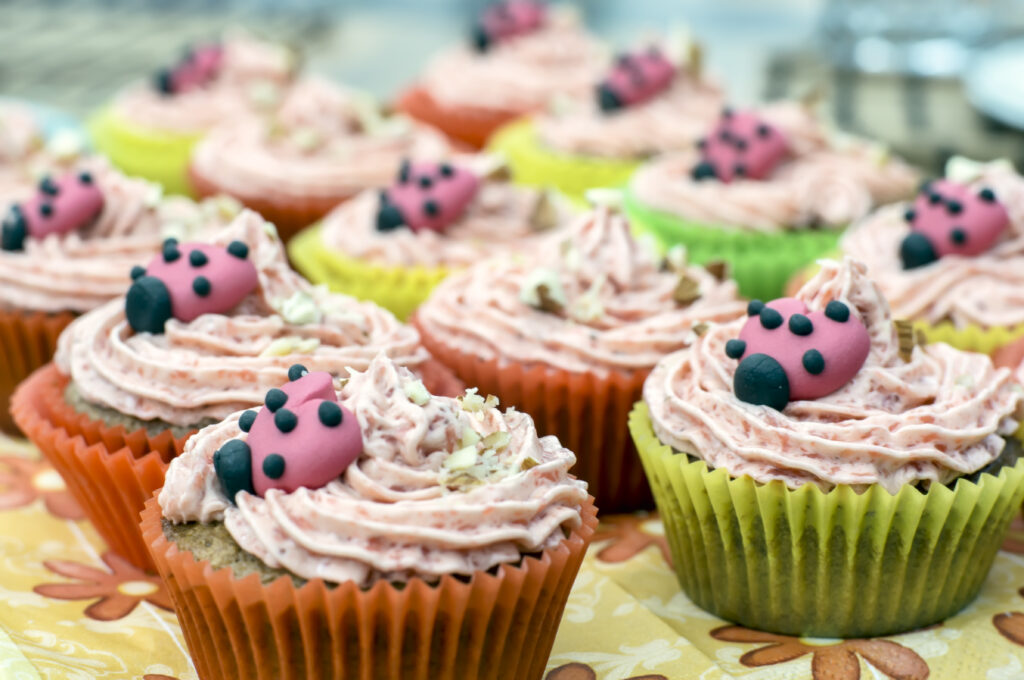 Colorful Cupcake Wallpaper with Fun Ladybug Designs for Food Lovers