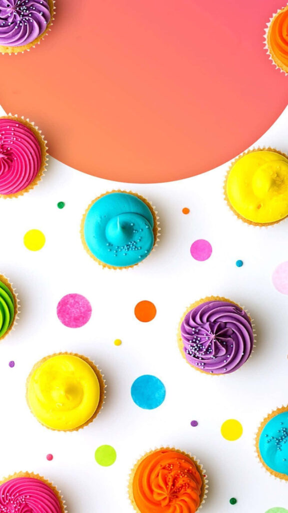 Colorful Cupcake Wallpaper: Cheerful Dots on White Background