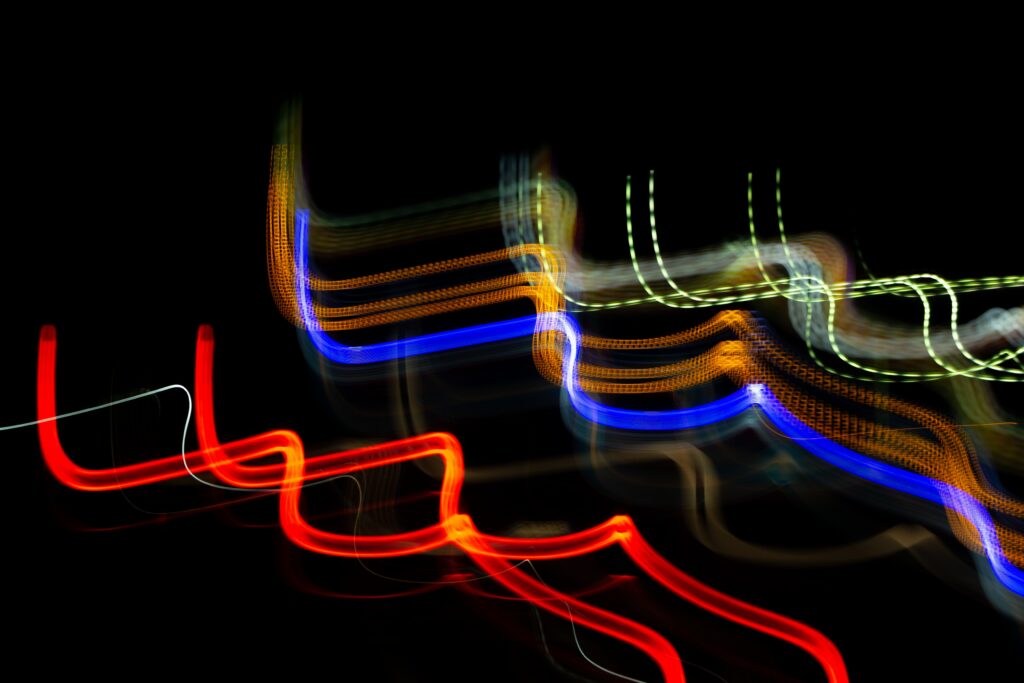 Colorful Curving Lines: Vibrant Freezelight Wallpaper Design
