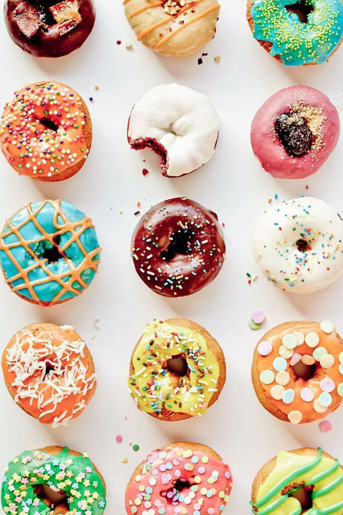 Colorful Donut Assortment Wallpaper for Food Lovers