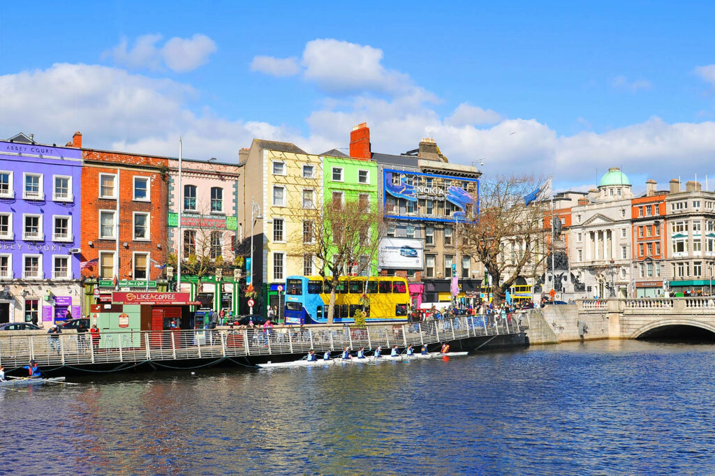 Colorful riverside buildings in Dublin city showcasing vibrant architecture and urban scenery wallpaper