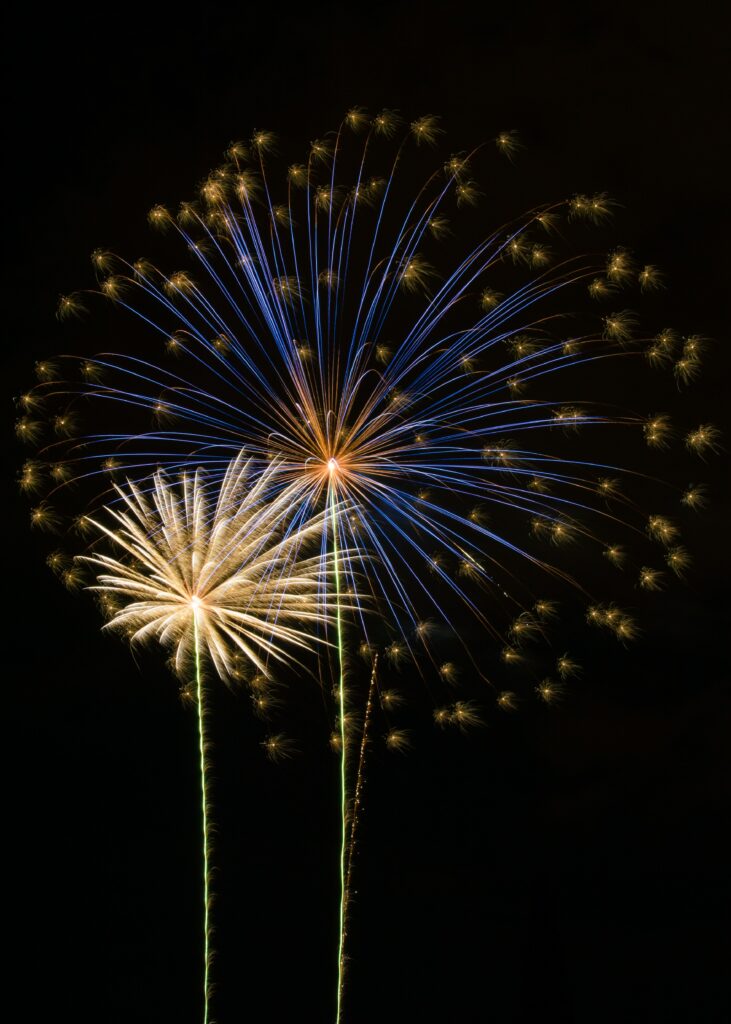 Vibrant Fireworks Wallpaper Background: Dazzling Night Sky Display