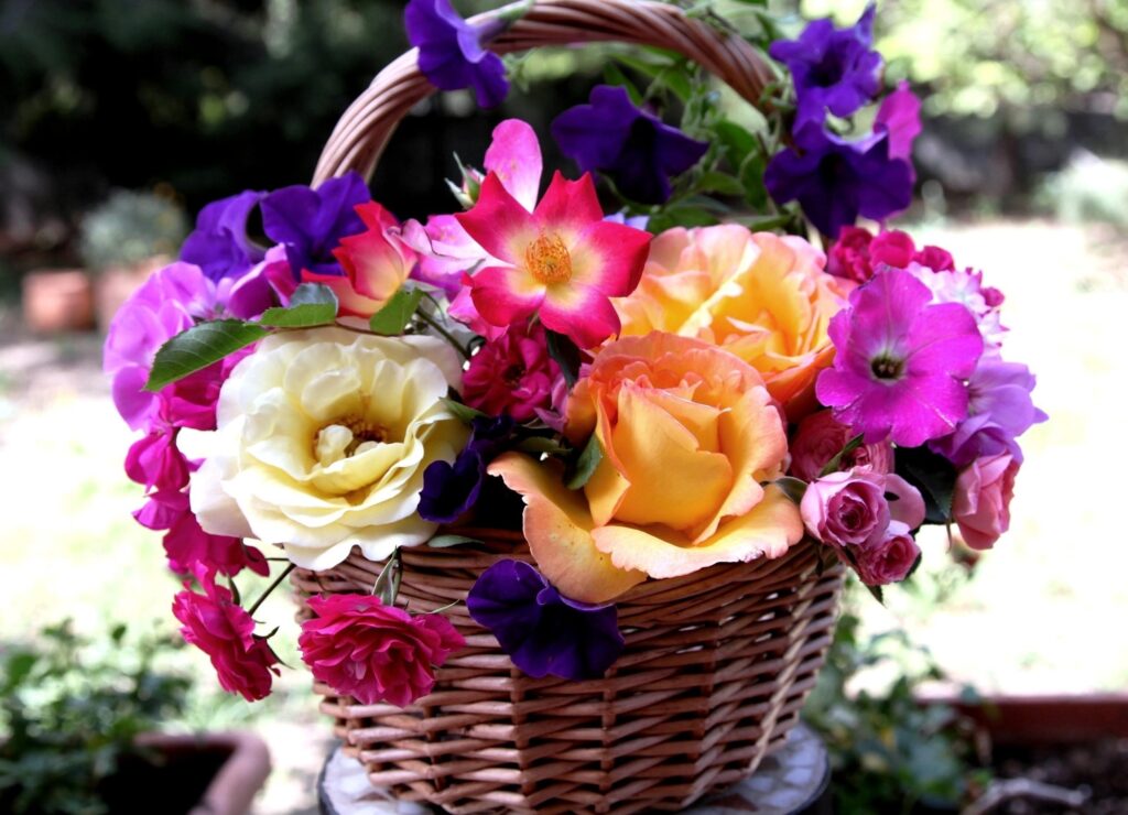Vibrant Floral Wallpaper: Wicker Basket of Colorful Flowers