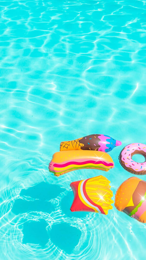 Colorful Food-Shaped Pool Floats – Minimalist iPhone Wallpaper