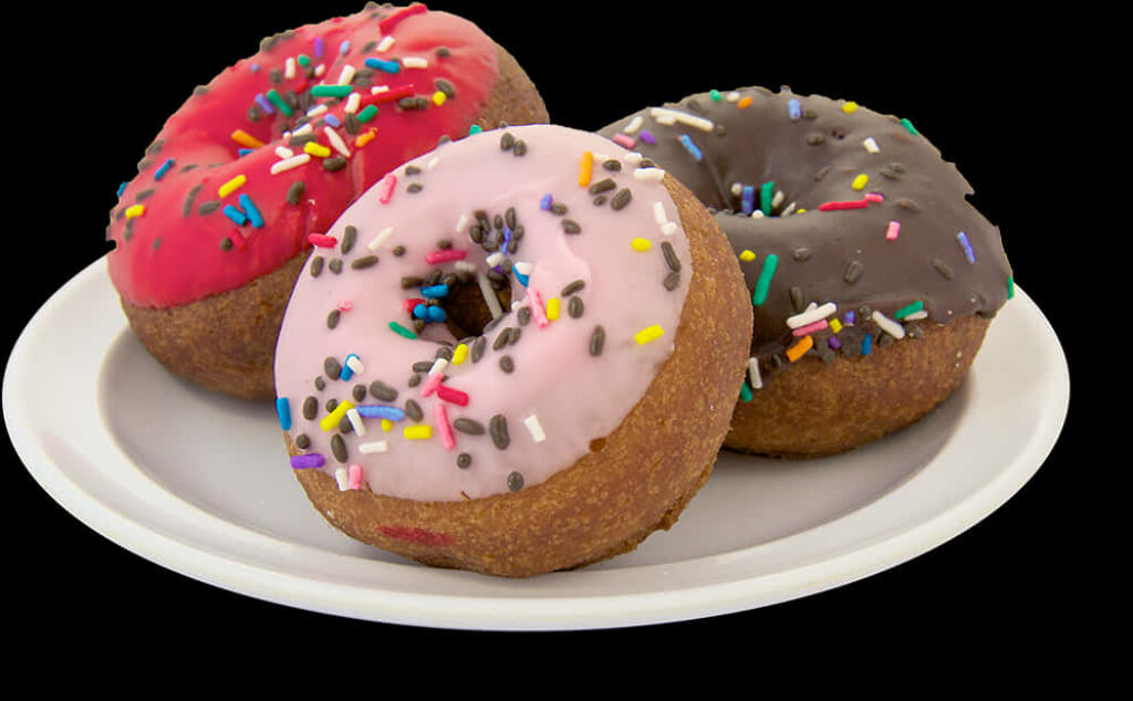 Colorful Frosted Donuts Wallpaper: Pink, Red & Chocolate Delights