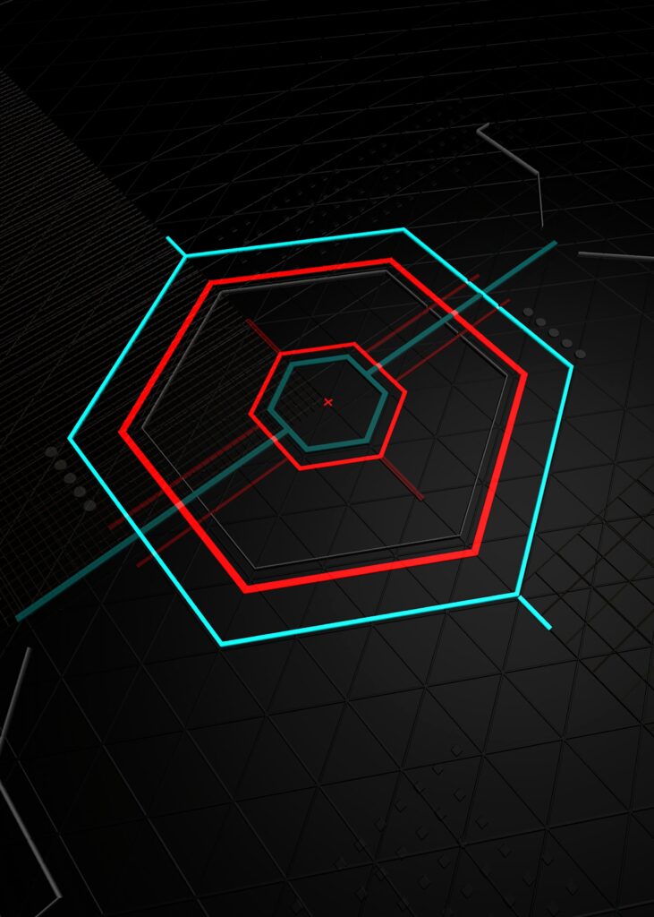 Vivid Geometric Hexagon Wallpaper in Red and Cyan on Dark Background