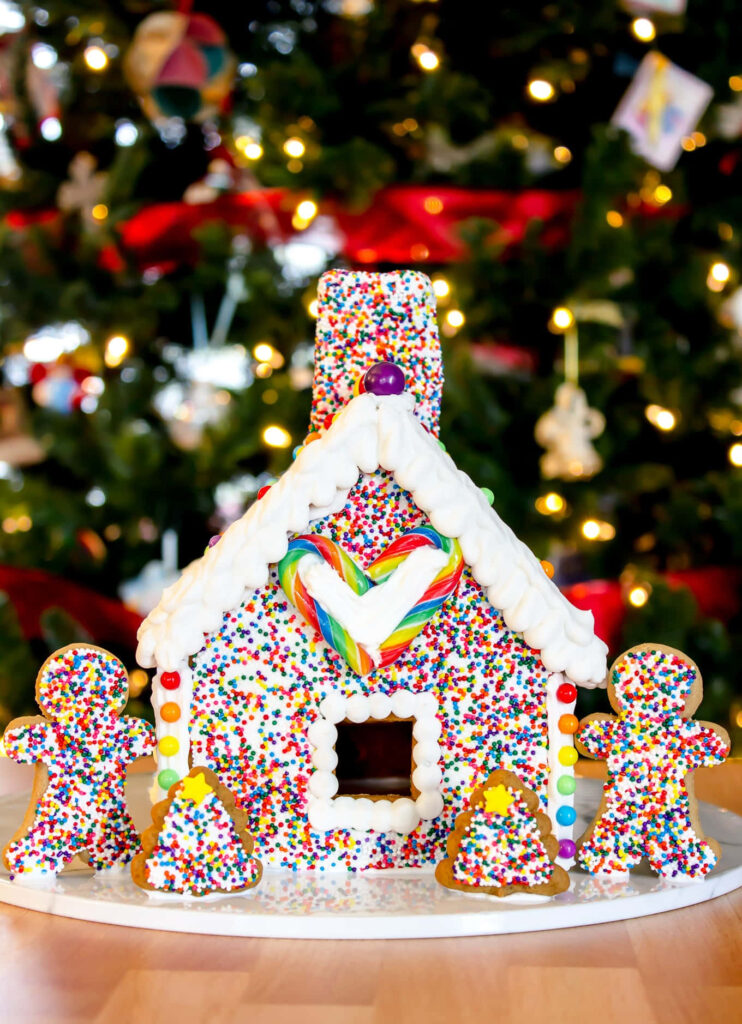 Colorful Gingerbread House Wallpaper with Christmas Spirit