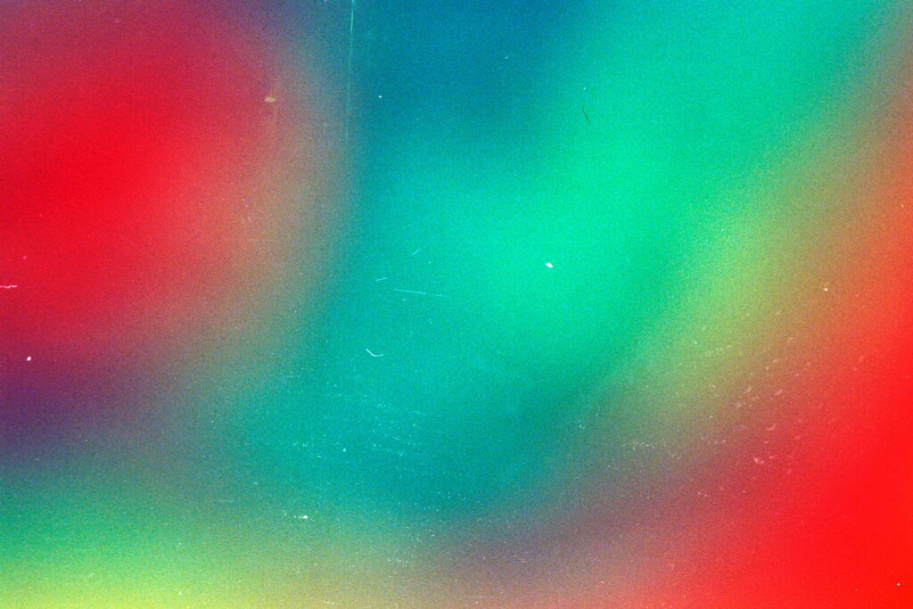 Vibrant Spots Unleashed: A Colorful Gradient Abstraction Flooding the Surface in a Paint-Like Display - QHD Wallpaper Background Photo